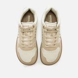 Zapatilla barefoot modelo Aria Brida Arena / Murri hueso